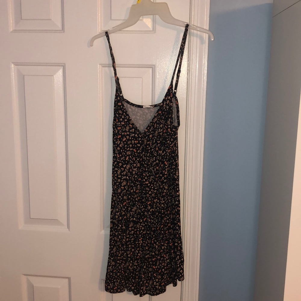BLACK FLORAL ROMPER